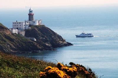 Dublin Bay Cruise boat passing lighthouse
